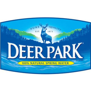 An image of a Deer Park water bottle. The water bottle is transparent with a blue label featuring the Deer Park logo. It is filled with clear, refreshing water. The bottle is capped with a blue lid and has droplets of condensation on the surface, indicating its cool temperature.
