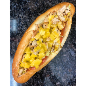 An image of a Chicken Cheese Steak sandwich. The sandwich consists of thinly sliced grilled chicken cooked to perfection. It is served on a soft roll and topped with melted cheese, usually provolone or American. The chicken cheese steak may also include sautéed onions, bell peppers, and mushrooms for added flavor. The sandwich is appetizing, offering a delicious twist on the classic cheesesteak.