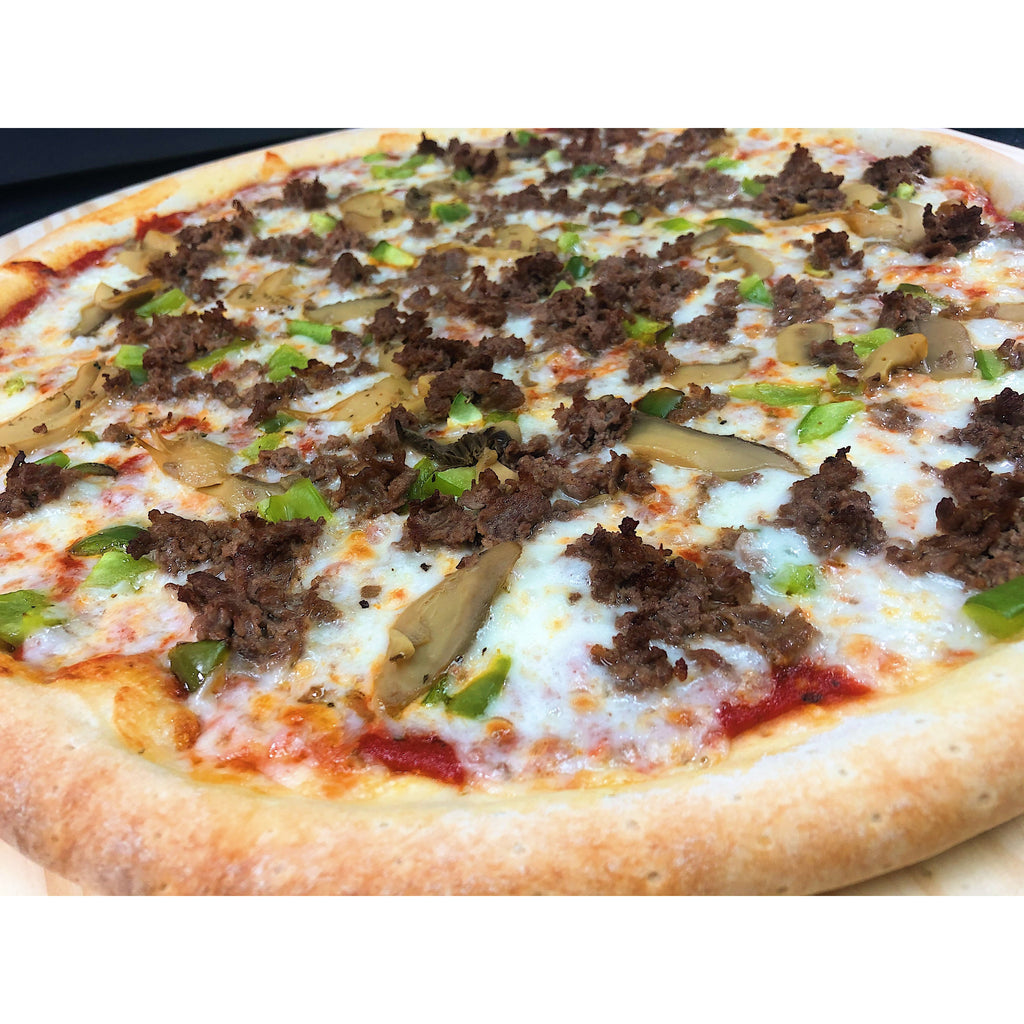  An image of a cheesesteak pizza. The pizza has a thin, crispy crust and is topped with slices of tender beefsteak, sautéed onions, bell peppers, and melted cheese. The combination of flavors mimics the iconic cheesesteak sandwich. The pizza is baked to perfection, with the cheese melted and slightly golden. It showcases a delicious fusion of two beloved dishes, the cheesesteak and pizza.