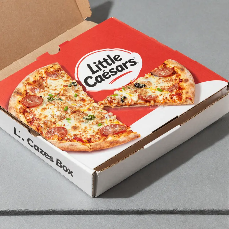 The enduring design of the Little Caesars pizza box, ensuring quality and freshness.